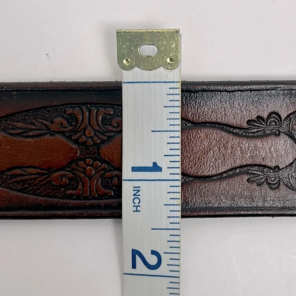 Brown tooled leather belt, unisex, approximately 34” see measurements in photos.